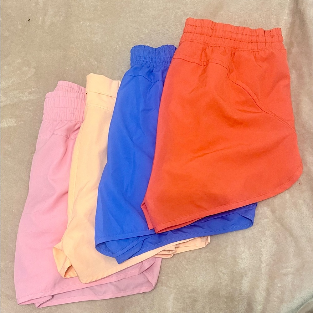 Women's Athletic Shorts in Pink, Peach, Blue, and Orange